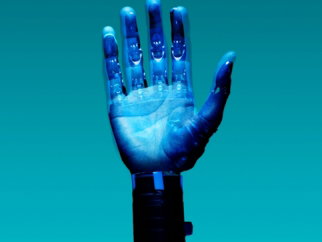 person holding blue light bulb